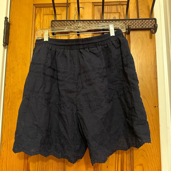 Two piece set.Never been worn. Tags on. Shorts and button down top. Large. - Picture 2 of 5